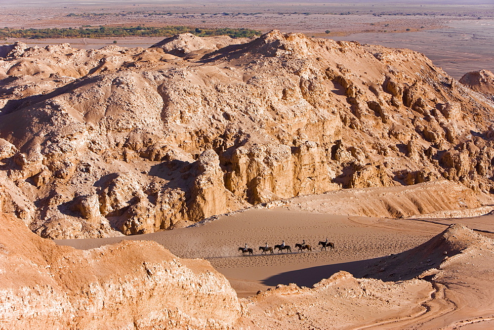 Tourists horse trekking, Valle de la Luna (Valley of the Moon), Atacama Desert, Norte Grande, Chile, South America