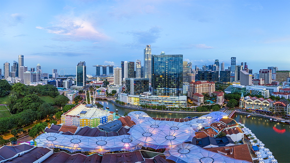 City skyline and riverside restaurants at the entertainment district of Clarke Quay, Singapore, Southeast Asia, Asia