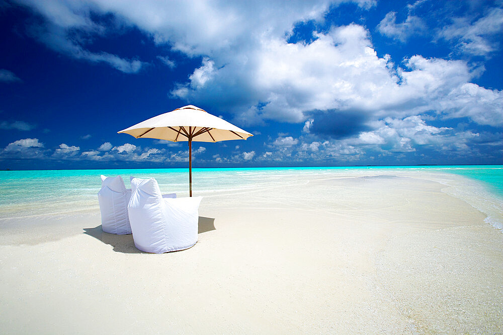 Two Lounge Chairs and Parasol on empty Beach, The Maldives, Indian Ocean, Asia