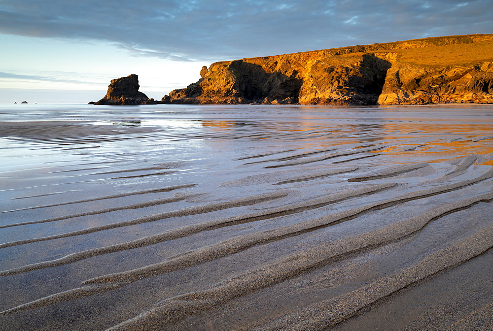 Low tide on a deserted Porthcothan Beach, Cornwall, England, United Kingdom, Europe