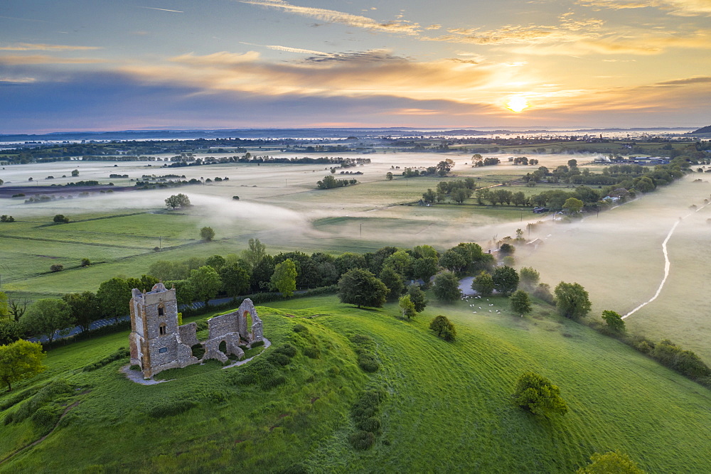 The ruins of St Michael's Church at sunrise in spring, Burrow Mump, Somerset, England, United Kingdom, Europe