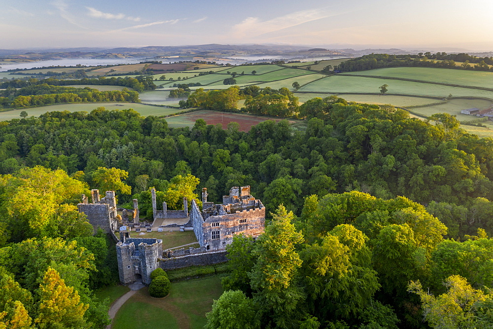 Aerial photograph of Berry Pomeroy Castle at dawn in spring, Devon, England, United Kingdom, Europe