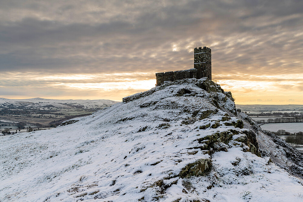 Brentor Church on a snowy outcrop on a winter morning, Dartmoor, Devon, England, United Kingdom, Europe