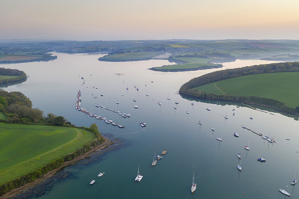 Aerial vista of the Kingsbridge Estuary at dawn in spring, Salcombe, South Hams, Devon, England, United Kingdom, Europe