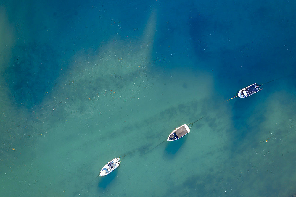 Aerial view of boats moored on the East Looe River, Looe, Cornwall, England, United Kingdom, Europe