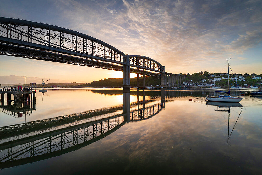 Sunrise over the Royal Albert Bridge which spans the River Tamar in Saltash, Cornwall, England, United Kingdom, Europe