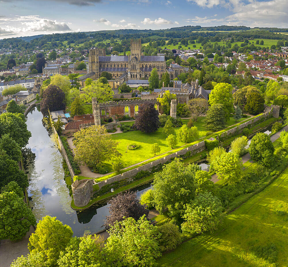 Aerial view of Wells Cathedral and Bishop's Palace, Wells, Somerset, England, United Kingdom, Europe