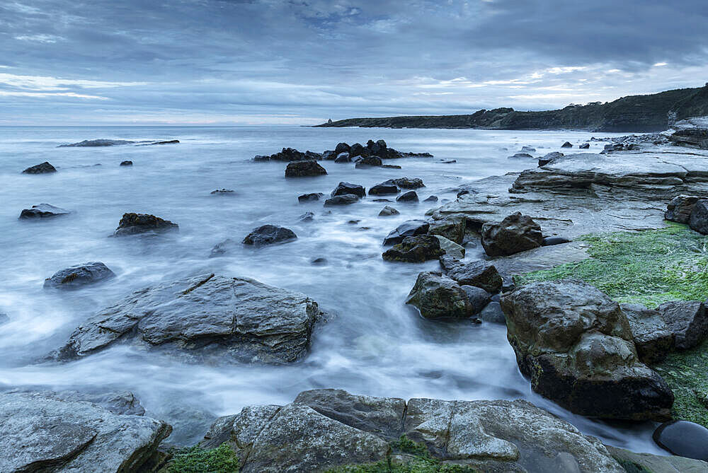 Twilight over the rocky shores of Swine Den near Howick, Northumberland, England, United Kingdom, Europe