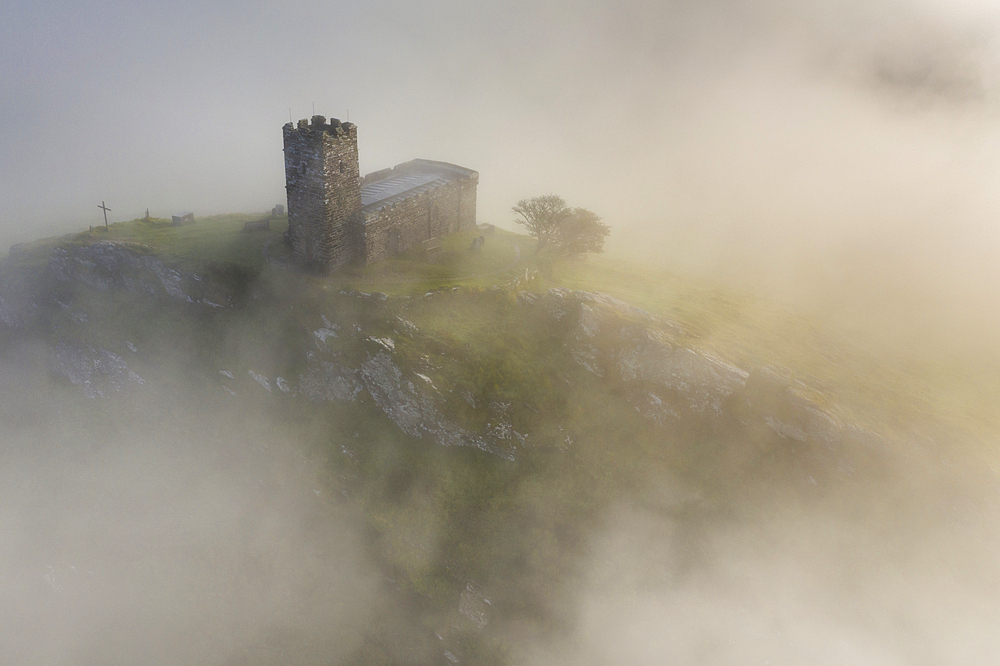 St. Michael de Rupe Church on the summit of Brentor on a misty September morning, Dartmoor, Devon, England, United Kingdom, Europe