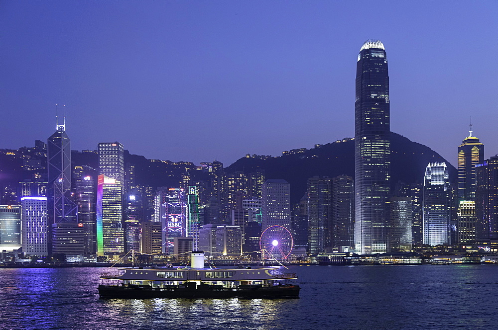 Star Ferry in Victoria Harbour at dusk, Hong Kong Island, Hong Kong, China, Asia