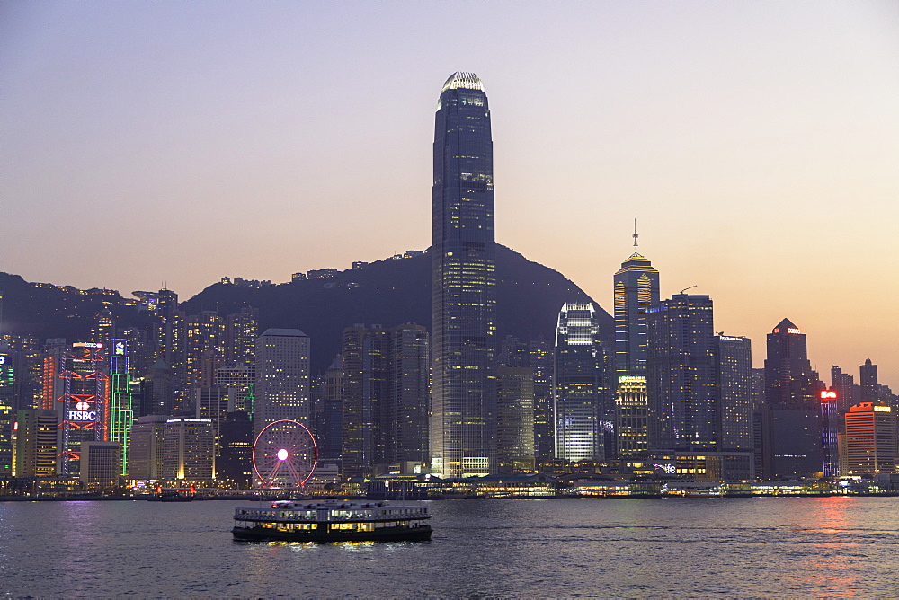 Star Ferry in Victoria Harbour at dusk, Hong Kong Island, Hong Kong, China, Asia