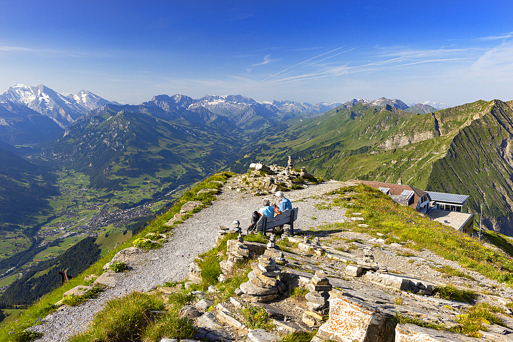 Couple at peak of Niesen mountain, Canton of Bern, Switzerland