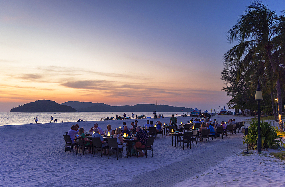 Al fresco dining at Casa del Mar Hotel at sunset, Cenang Beach, Langkawi, Kedah, Malaysia