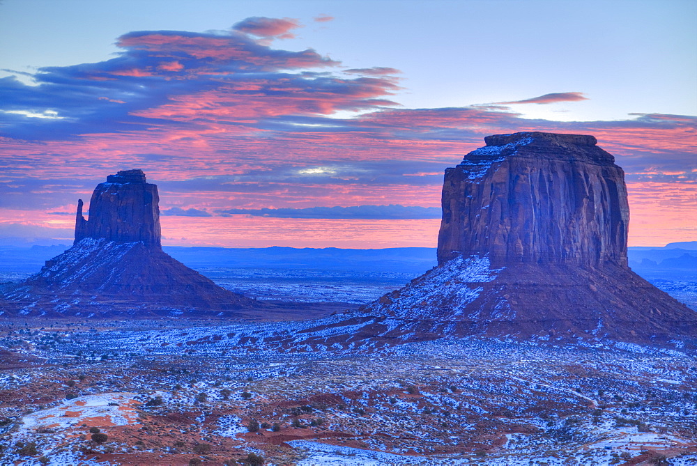 Sunrise, East Mitten Butte on left and Merrick Butte on right, Monument Valley Navajo Tribal Park, Utah, United States of America, North America