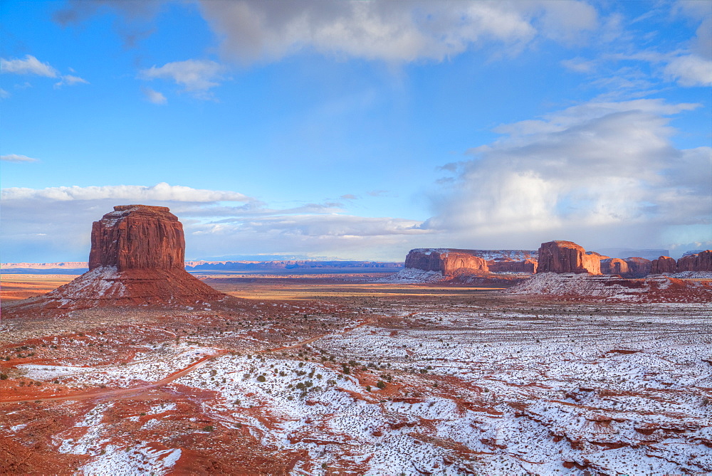 Sunrise, Merrick Butte on left, Spearhead Mesa on right, Monument Valley Navajo Tribal Park, Utah, United States of America, North America