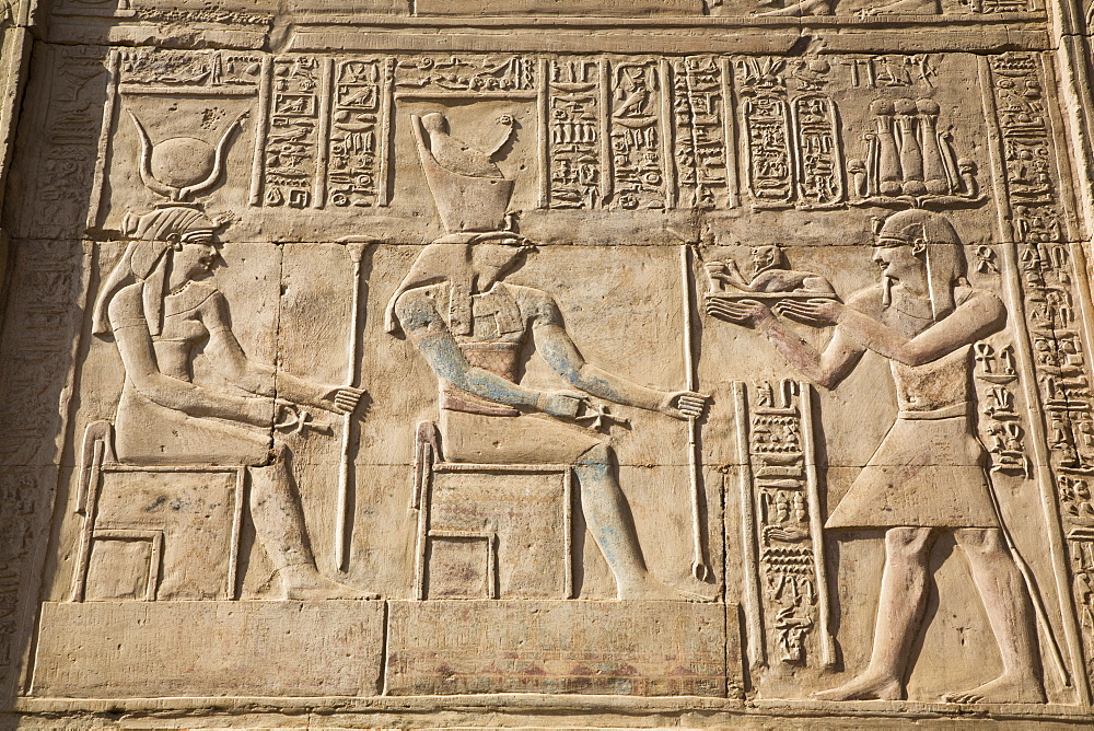 Gods Hathor on left and Haroeris in centre with Pharaoh on the right, Wall Reliefs, Temple of Sobek and Haroeris, Kom Ombo, Egypt, North Africa, Africa