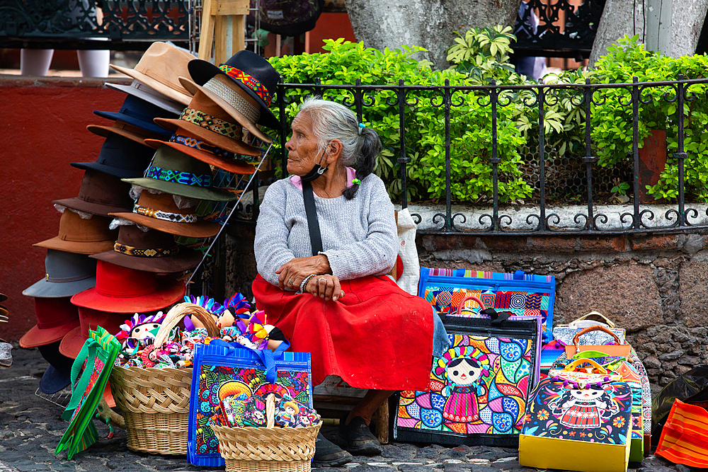 Woman Vendor selling handicrafts and hats, Taxco, Guerrero, Mexico, North America