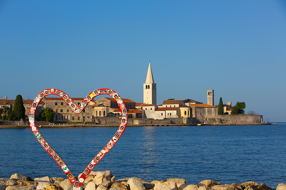 Love Symbol, Red Heart, Tower of Euphrasian Bascilica in the background, Old Town, Porec, Croatia, Europe