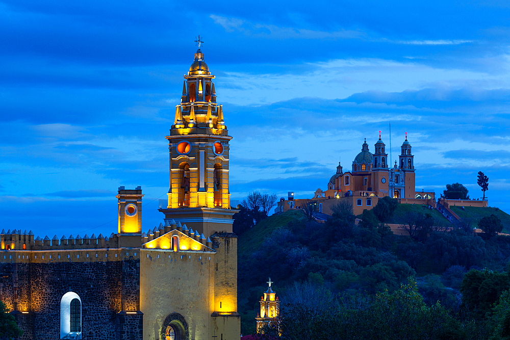 Evening, Convent of San Gabriel Arcangel in the foreground, Church de Nuestra Senora de los Remedios in the background, Cholula, Puebla State, Mexico, North America