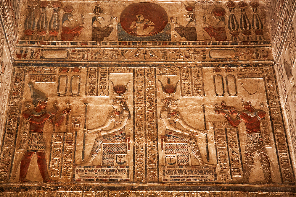 Reliefs of the Goddess Hathor in center, with Pharaohs to left and right, Sanctuary, Temple of Hathor, Dendera, Qena, Egypt, North Afica, Africa