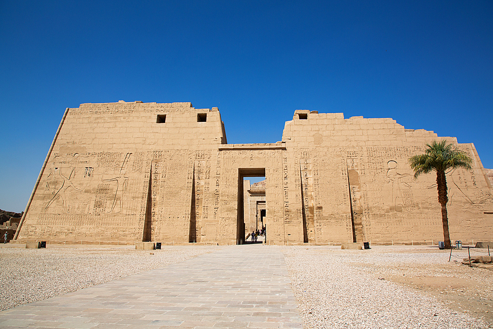 First Pylon, Medinet Habu, Mortuary Temple of Ramesses III, 1187-56 BCE, Ancient Thebes, UNESCO World Heritage Site, Luxor, Egypt, North Africa, Africa