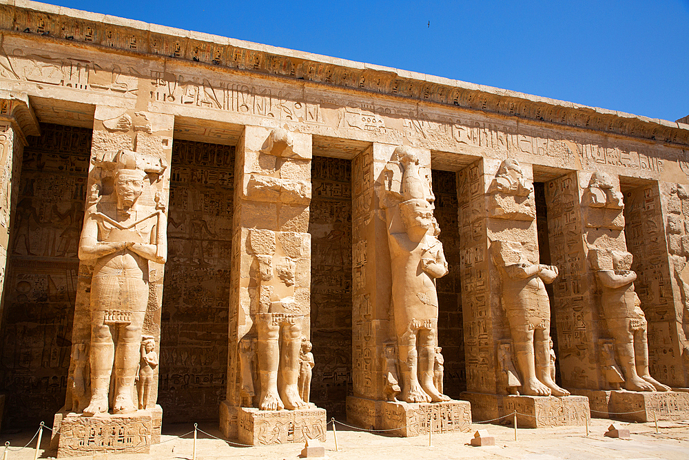 Osirian Statues, Northern Portico, First Courtyard, Medinet Habu, Mortuary Temple of Ramesses III, 1187-56 BCE, Ancient Thebes, UNESCO World Heritage Site, Luxor, Egypt, North Africa, Africa