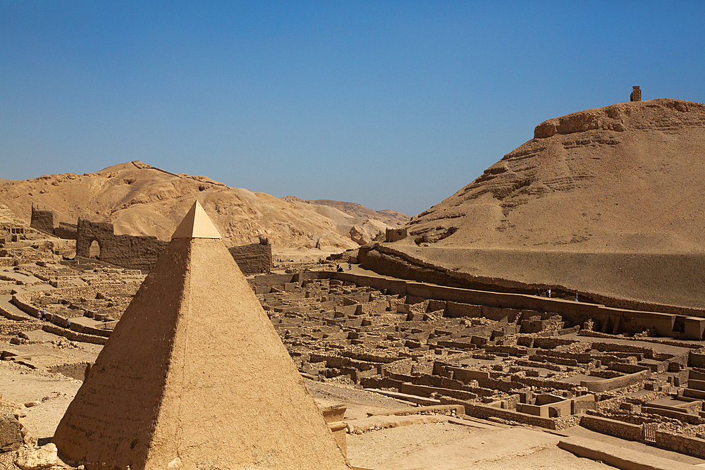 Tomb Entrance in foreground, Ruins of Workmen's Village in the background, Deir el-Medina, Ancient Thebes, UNESCO World Heritage Site, Luxor, Egypt, North Africa, Africa