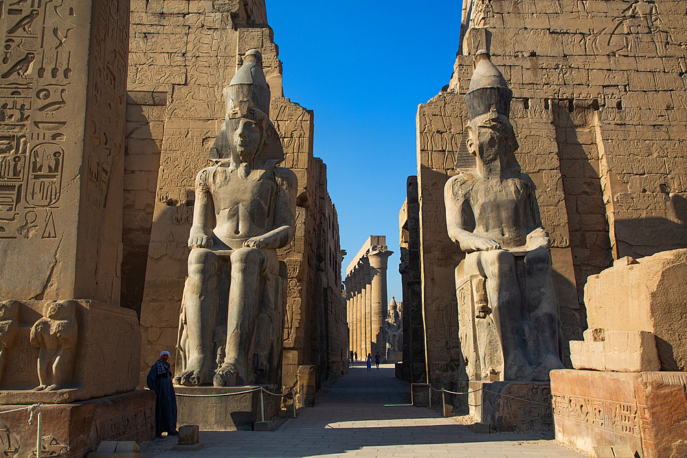 Statues of Rameses II, First Pylon of Rameses II, Luxor Temple, UNESCO World Heritage Site, Luxor, Egypt, North Africa, Africa