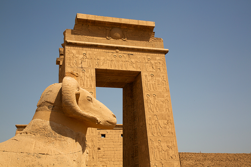 Gate to the Temple of Khonsu, Ram-Headed Sphinx in foreground, Karnak Temple Complex, UNESCO World Heritage Site, Luxor, Egypt, North Africa, Africa