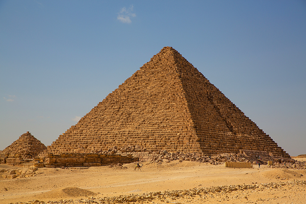 Man on Camel, Pyramid of Menkaure in background, Giza Pyramid Complex, UNESCO World Heritage Site, Giza, Egypt, North Africa, Africa