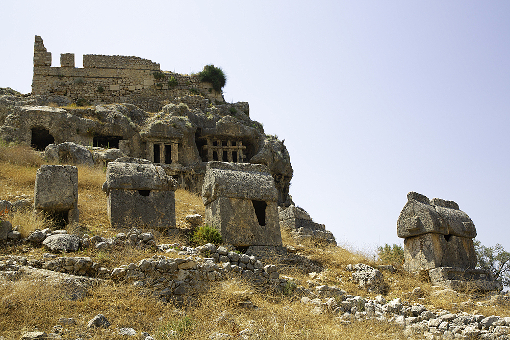 Sarcophagai, 4th century BC - 3rd century AD, Rock Tombs (background), Tlos, Ancient Lycian City, Mugla Province, Turkey