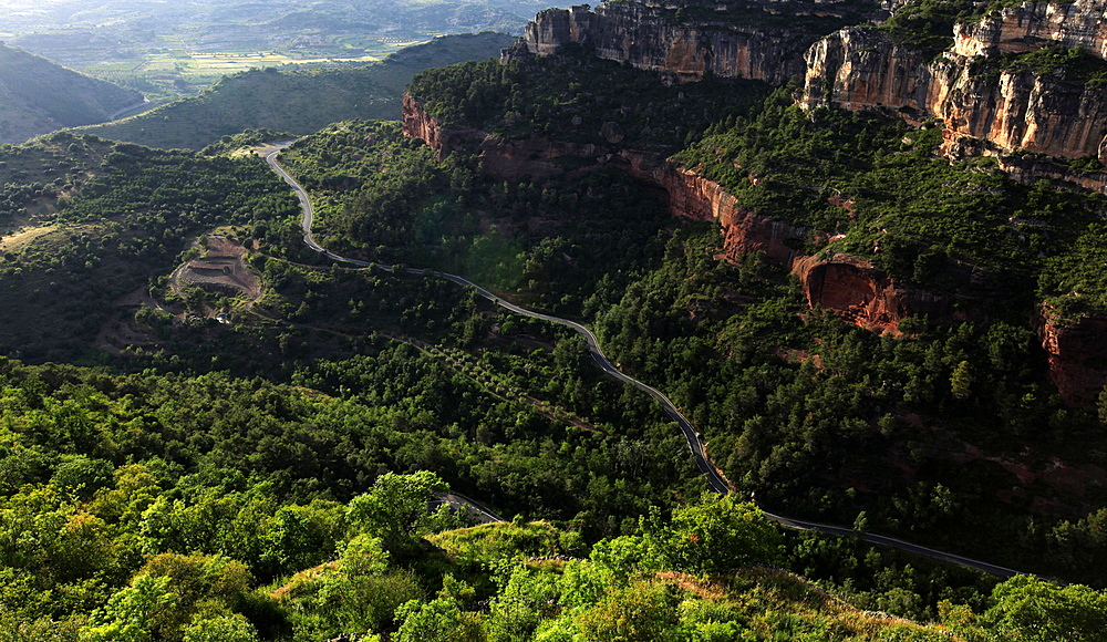 View across the limestone ravine beaneath the medieval village of Siurana, near Reus and Barcelona, Catalonia, Spain, Europe