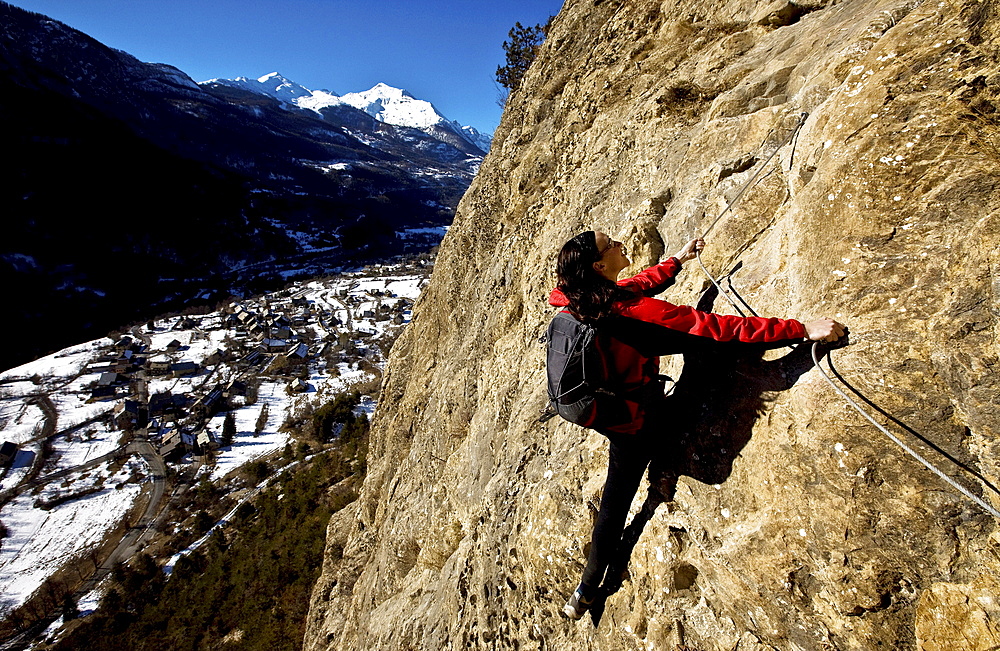 Climbing a via ferrata course near Vallouise, Ecrins Massif, France, Europe