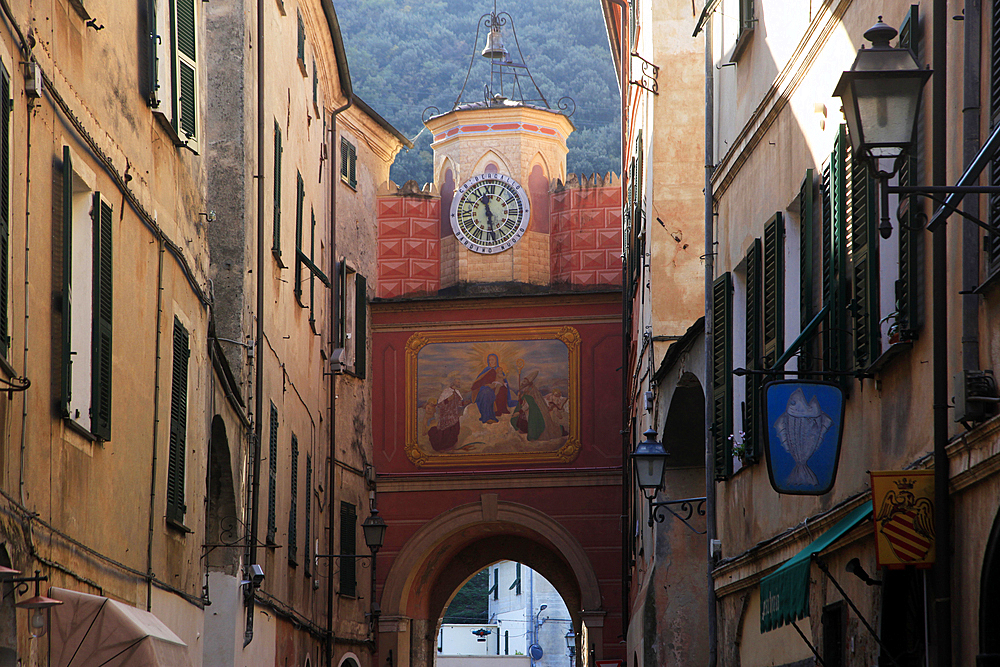 Narrow street in the old town of Finale, Liguria, Italy, Europe