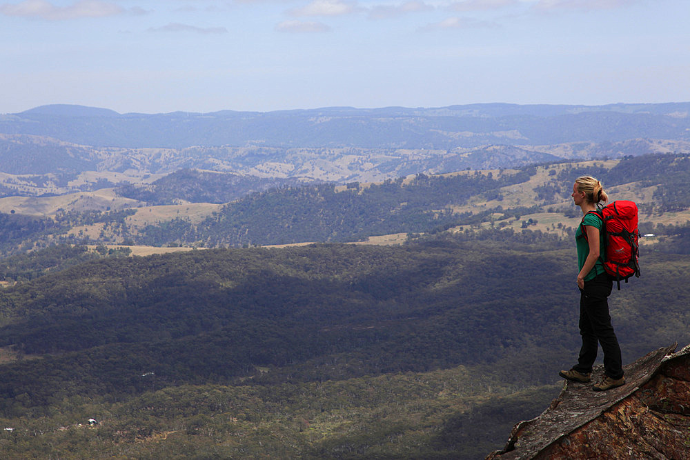 A woman looking across the plains near Three Peaks, Katoomba, Blue Mountains, New South Wales, Australia, Pacific