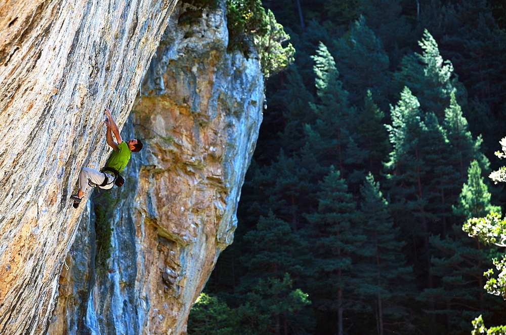 A climber scales cliffs at Bielsa, Spanish Pyrenees, Spain, Europe