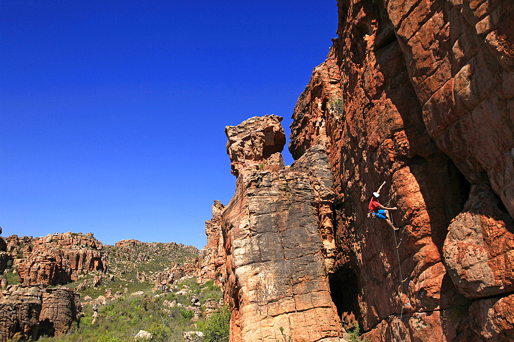 A climber on the sandstone cliffs of the Cederberg Mountains, Western Cape, South Africa, Africa