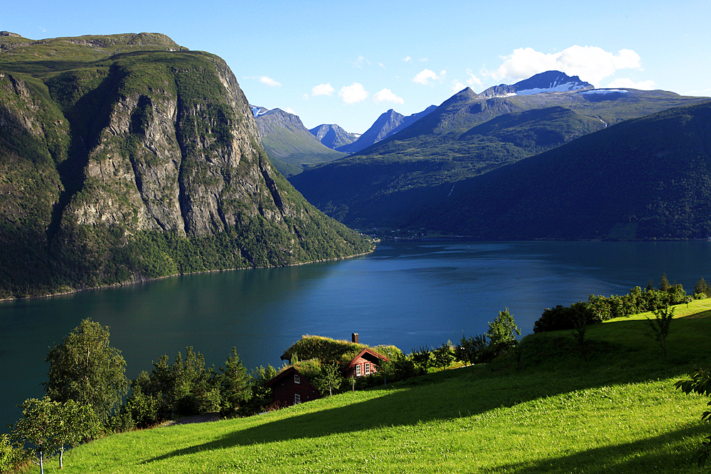 A house above the fjord at Valldal, Norway, Scandinavia, Europe