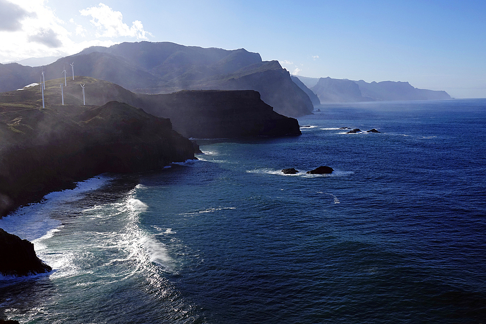 The dramatic sea cliffs of the northwest coast rise beyond the Sao Lourenco peninsula, eastern Madeira, Portugal, Atlantic Ocean, Europe