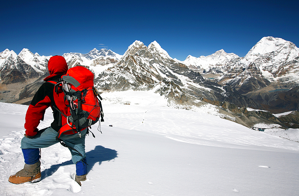 Mountaineer looking towards Everest, Khumbu, Himalayas, Nepal, Asia