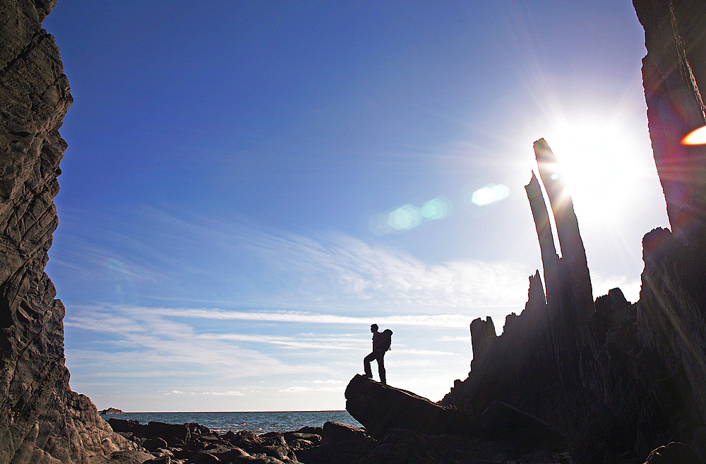 Hiker on a summer evening, Hartland Quay, Devon, England, United Kingdom, Europe