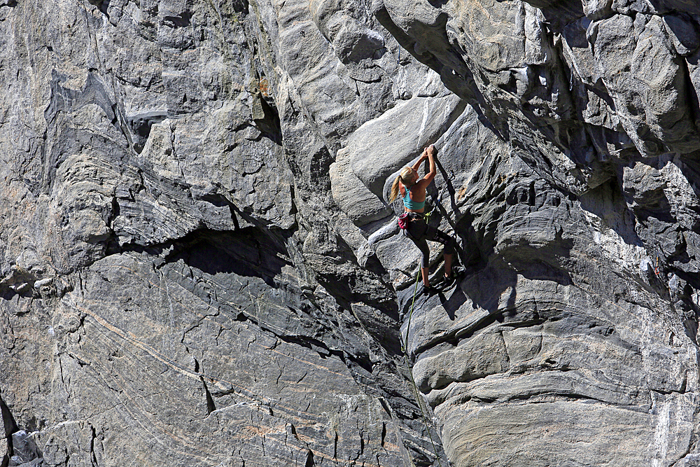 Rock climber in action at Flatanger, Trondelag, Norway, Scandinavia, Europe