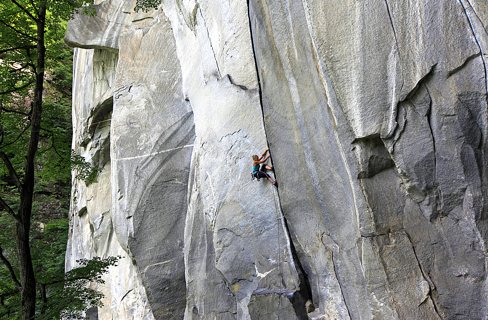 Rock climber in action, Cadarese, Italian Alps, northern Italy, Europe