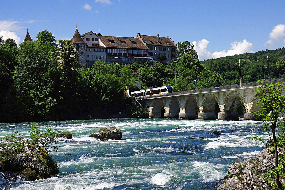 Rail bridge across the River Rhine at Rheinfall (Rhine Falls), near Schauffhausen, Switzerland, Europe