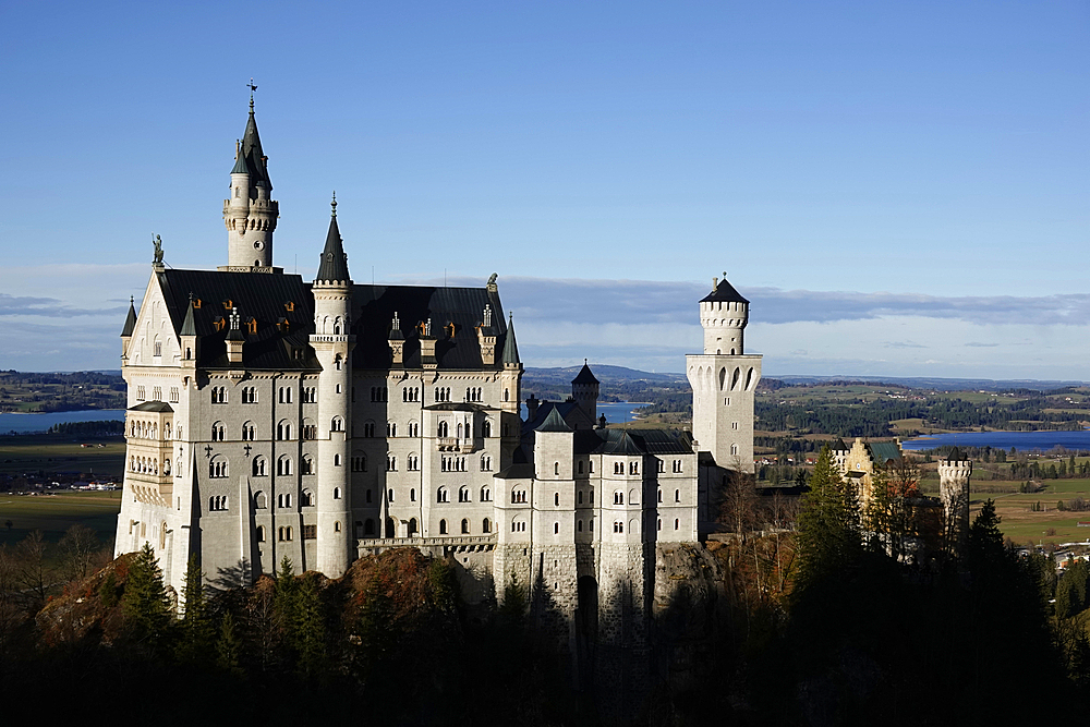 Neuschwanstein Castle, Southern Bavaria. This 19th-century historicist palace is built on a rugged hill of the foothills of the Alps in the very south of Germany and is a UNESCO World Heritage site.