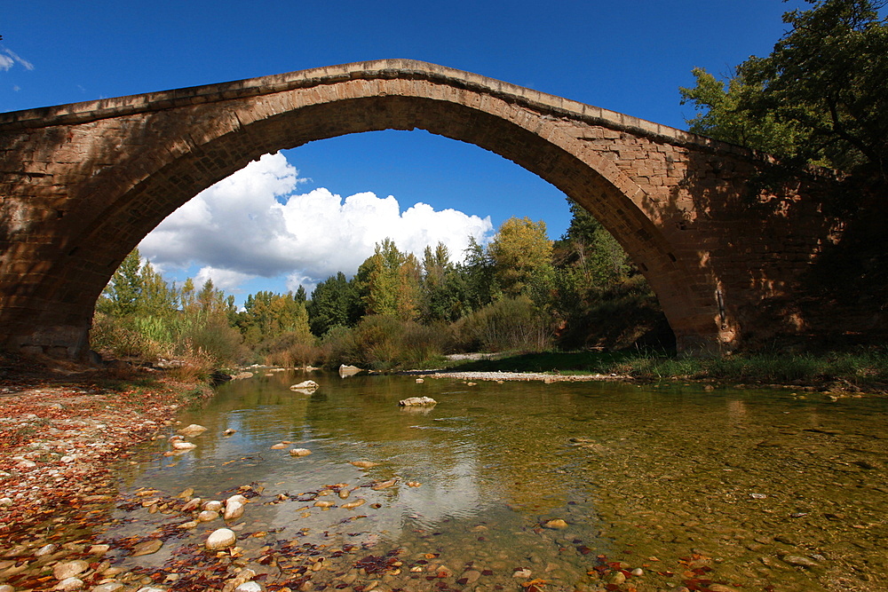 Traditional medieval packhorse bridge near Barbastro, south of the Sierra de Guara mountains, Aragon, Spain, Europe