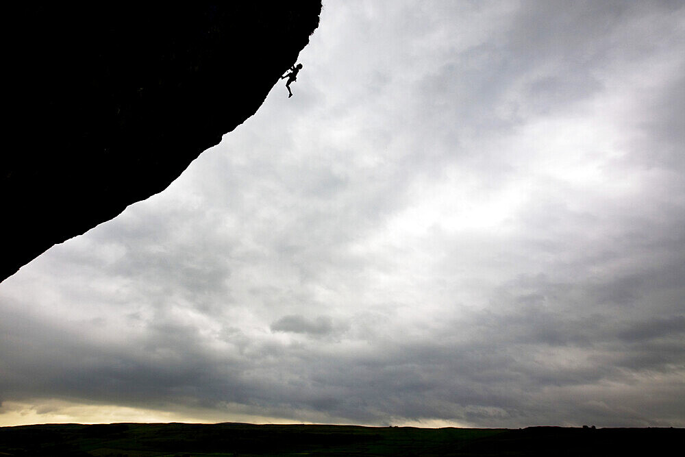 Climber in action, Kilnsey Crag, North Yorkshire, England, United Kingdom, Europe