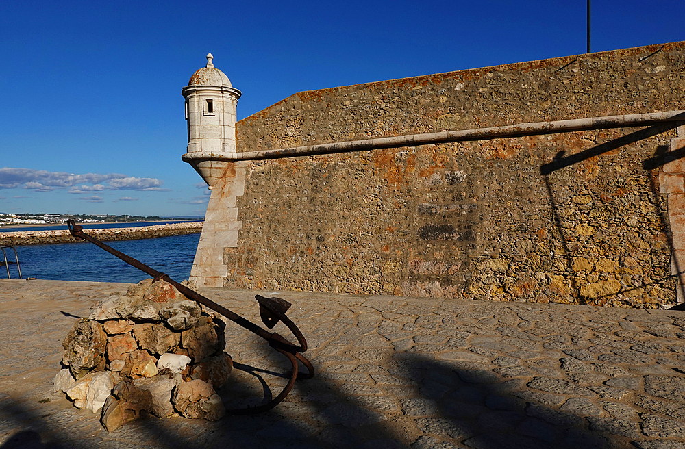 The harbour and Fort da Ponta da Bandeira in the Old Town of Lagos, Algarve, Portugal