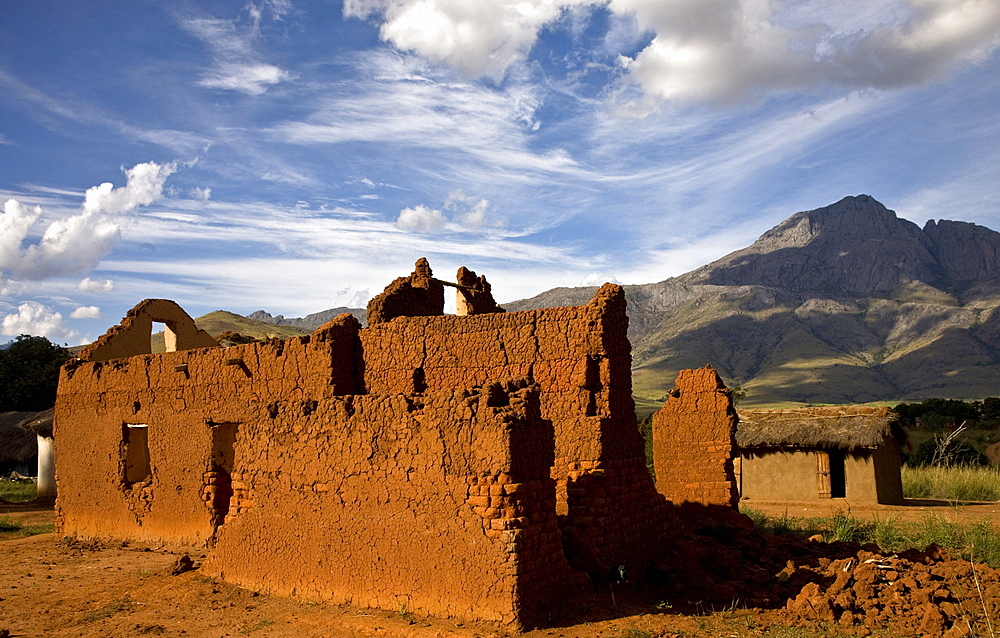 Laterite brick buildings in the village of Sovakimby, Andringitra National Park, Madagascar, Africa