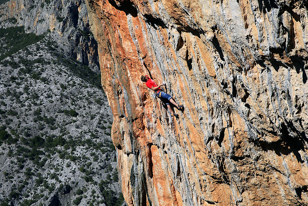 Rock climber in action at Leonidio, north-eastern Peloponnese, Greece